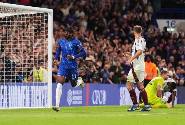 Noni Madueke celebrates scoring for Chelsea