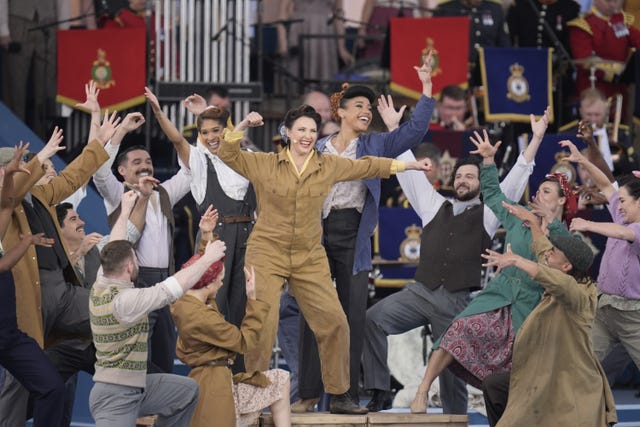 Emma Barton (centre) performs Sing As We Go during the UK’s national commemorative event for the 80th anniversary of D-Day, hosted by the Ministry of Defence on Southsea Common in Portsmouth, Hampshire 