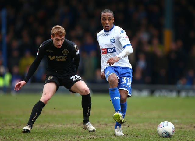 Neil Danns (right) was Bury captain