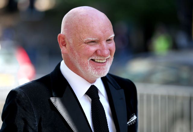 Sir Tom Hunter smiling