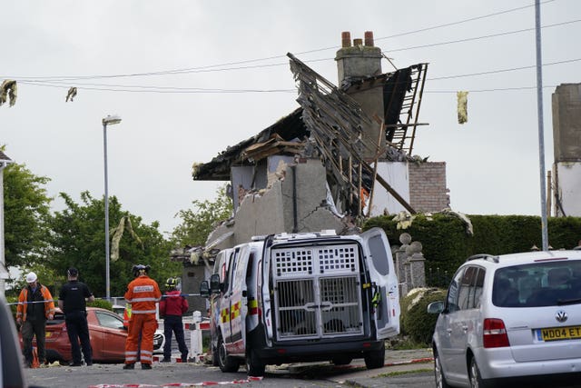 The blast destroyed three houses