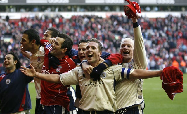 Brian Howard celebrates with Barnsley team-mates