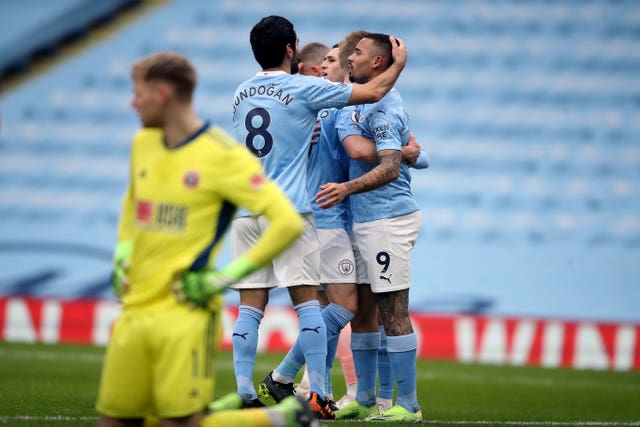 Manchester City players celebrate following Gabriel Jesus' first-half strike