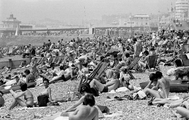The scene on Brighton beach as temperatures soared during June 1976 (Image: PA)