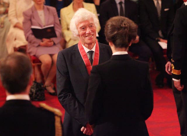 Cinematographer Roger Deakins is made a CBE by the Princess Royal at an Investiture ceremony at Buckingham Palace. (PA Images)