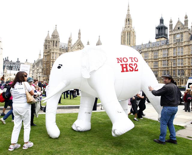 Members of STOP HS2 with their 10 foot high inflatable white elephant outside Parliament