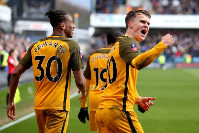 Solly March saw his injury-time free-kick drop into Millwall's goal to level the tie.