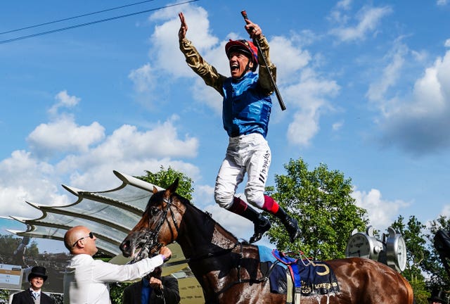 Frankie Dettori leaps from Gregory in the Ascot winner’s enclosure 