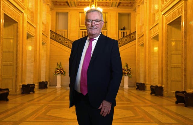 Ulster Unionist Party leader-elect Mike Nesbitt before speaking to members of the media outside Stormont, Belfast 