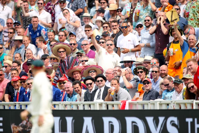 David Warner (foreground) is barracked by England fans while fielding at Edgbaston.