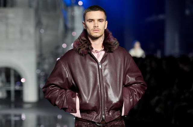 Romeo Beckham on the catwalk at the Burberry show