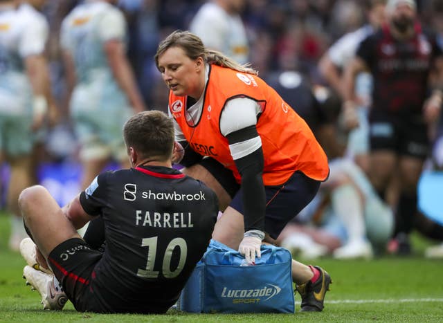 Owen Farrell receiving treatment at Tottenham Hotspur Stadium
