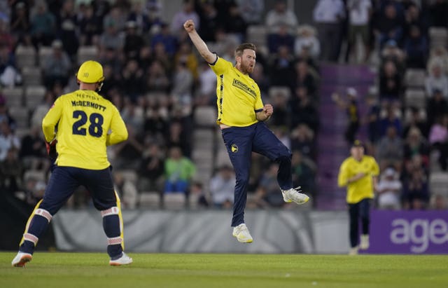 Liam Dawson, centre, will be part of the Hampshire team looking to retain their Vitality Blast title this weekend (Andrew Matthews/PA)