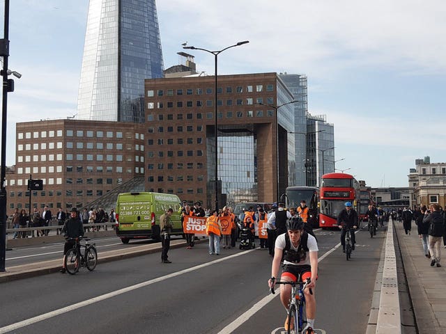 Just Stop Oil activists stage a slow walk protest in central London