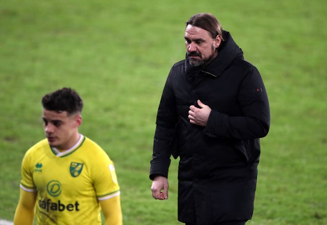 Norwich City manager Daniel Farke (right) walks off with Max Aarons (left)