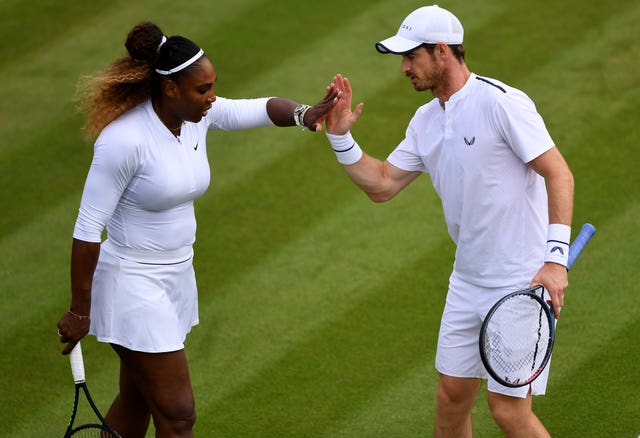 Andy Murray, right, and Serena Williams high five