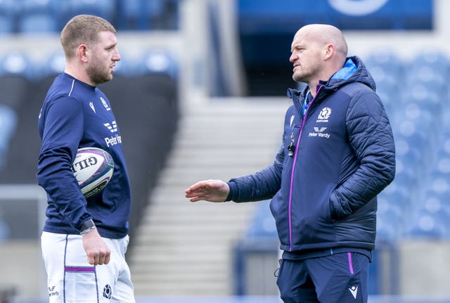 Finn Russell, left, speaks with Scotland head coach Gregor Townsend