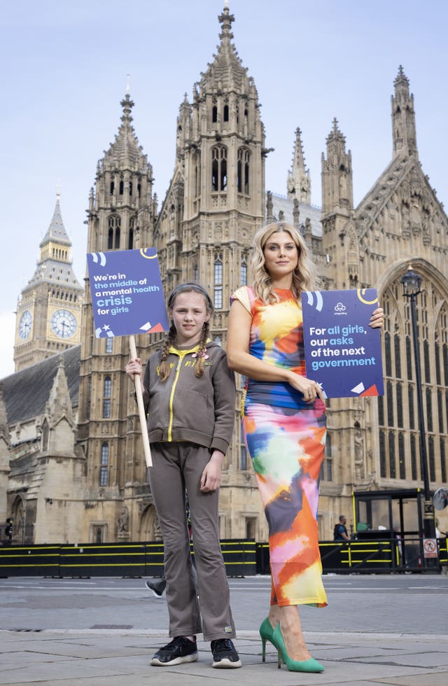 Television presenter Ashley James with Girlguiding member Angel Scott, nine, as the UK’s largest youth organisation dedicated to girls has set out how the next government should better prioritise the needs, happiness and safety of girls and young women, London