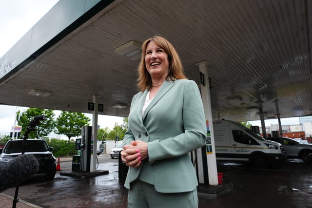 Rachel Reeves standing on a fuel station forecourt
