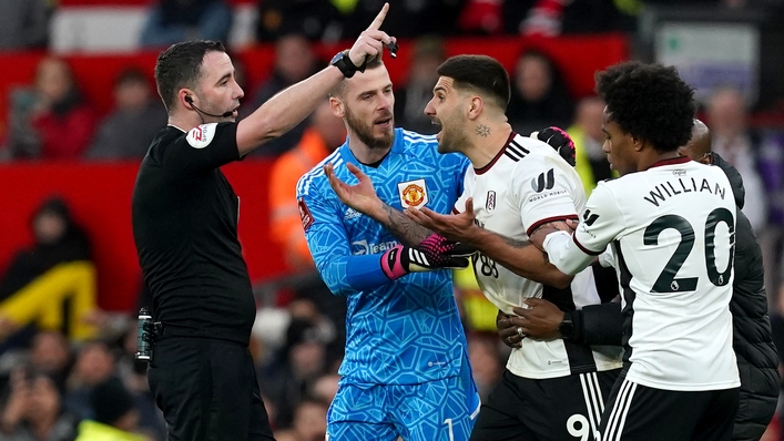 Fulham’s Aleksandar Mitrovic (centre) is sent off by referee Chris Kavanagh during the Emirates FA Cup quarter-final match at Old Trafford, Manchester. Picture date: Sunday March 19, 2023.