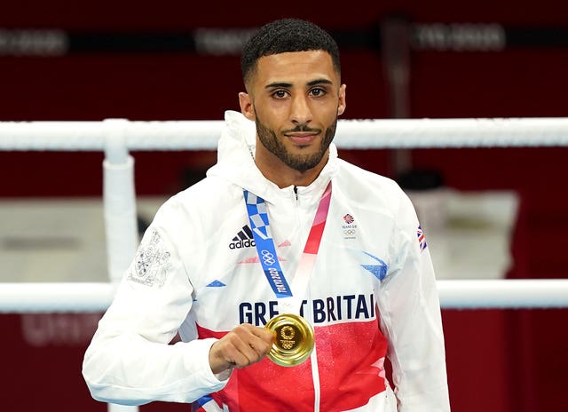 Great Britain’s Galal Yafai celebrates with the gold medal after the men’s fly final Bout at the Tokyo 2020 Olympic Games in Japan.