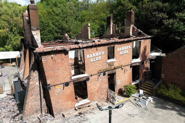 The fire at the Crooked House required 30 firefighters to extinguish (Jacob King/PA)