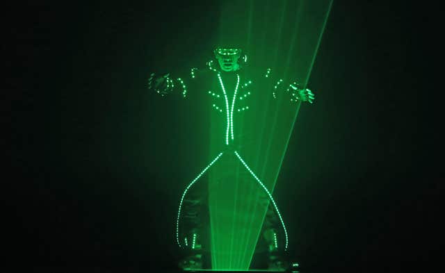 A performer from the Duo Lugo Laser act (Niall Carson/PA)
