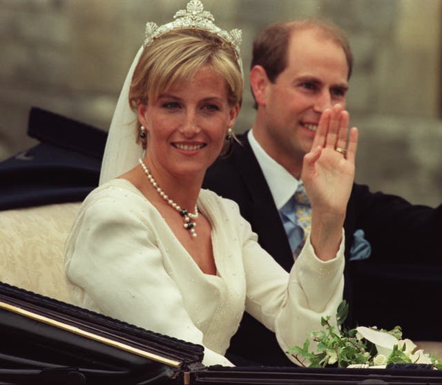 The Earl and Countess of Wessex ride through the streets of Windsor after their wedding (Toby Melville/PA)