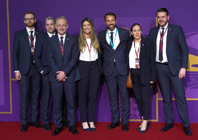 England manager Gareth Southgate (centre right) and members of he England delegation during the World Cup draw in Qatar