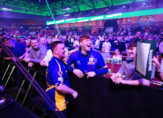 Luke Littler, left, jokes with AngryGinge