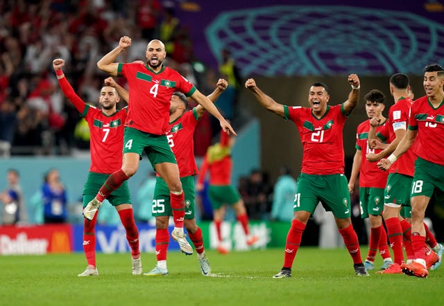 Morocco players celebrate at the World Cup
