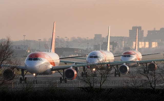 EasyJet planes queue to take off at London Gatwick Airport in Crawley, West Sussex