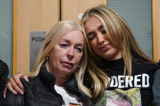 John George’s mother Sharon and sister Caitlin return to Belfast Airport 