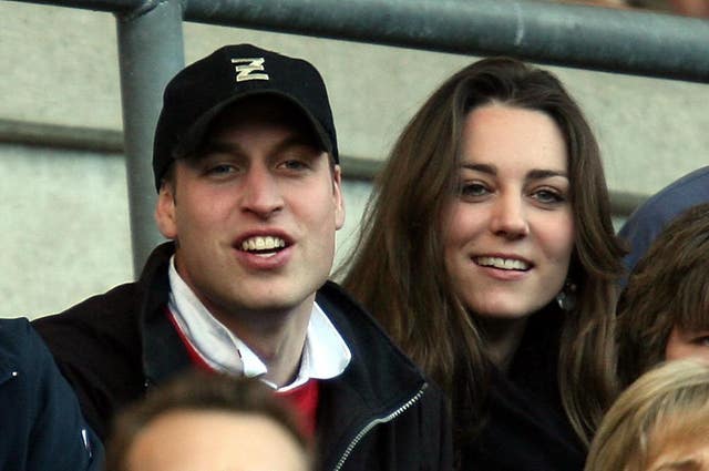 William wearing a cap sat next to Kate in the stands at Twickenham to watch England play Italy in the Six Nations in 2007