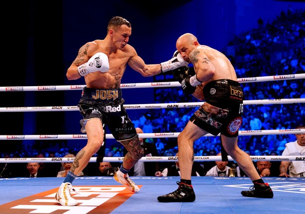 Josh Warrington (left) in action against Kiko Martinez