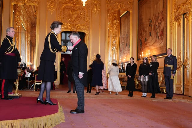 Jonathan Ashworth receives his honour from the Princess Royal