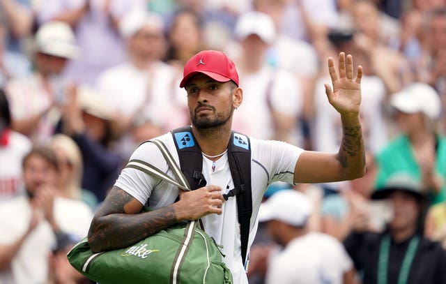 Nick Kyrgios acknowledges the crowd after reaching the quarter-finals