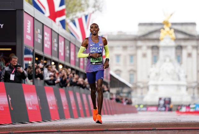 Sir Mo Farah crosses the finish line in the 2023 London Marathon