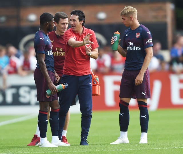 Unai Emery (centre) has been working closely with a number of Arsenal's younger players.