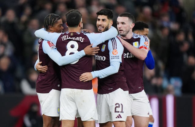 Marco Asensio (centre right) celebrates with team-mates