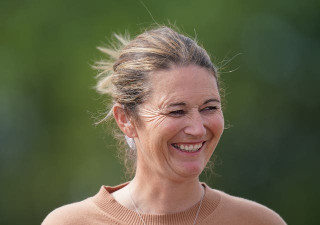 Charlotte Edwards smiling on commentary duty.