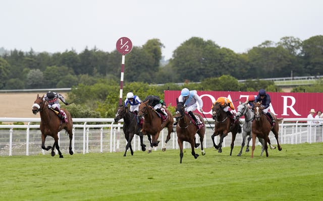 Team Of Endearment (centre right) on her way to victory at Goodwood