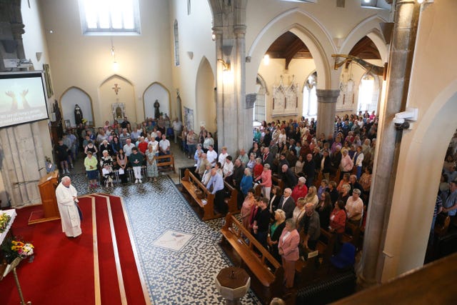 People attend a vigil for three women and a boy who were injured in a horror motorway crash in on the M9 in Co Kildare 