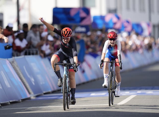 Dame Sarah Storey crossing the finish line in the women's Paralympic C4-5 road race