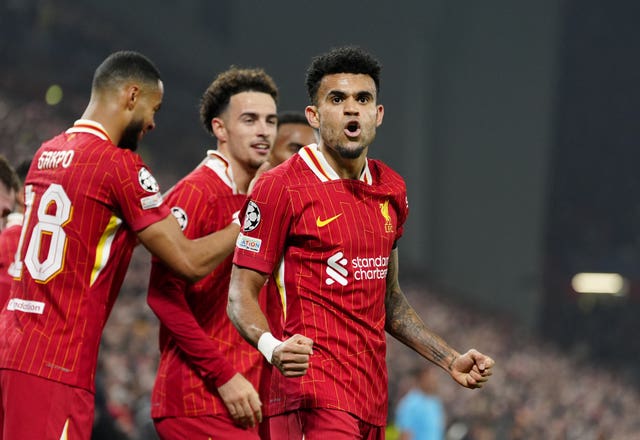 Luis Diaz, right, celebrates with his team-mates after scoring