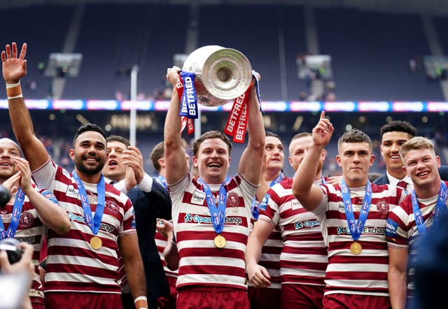 Wigan lift the Challenge Cup trophy