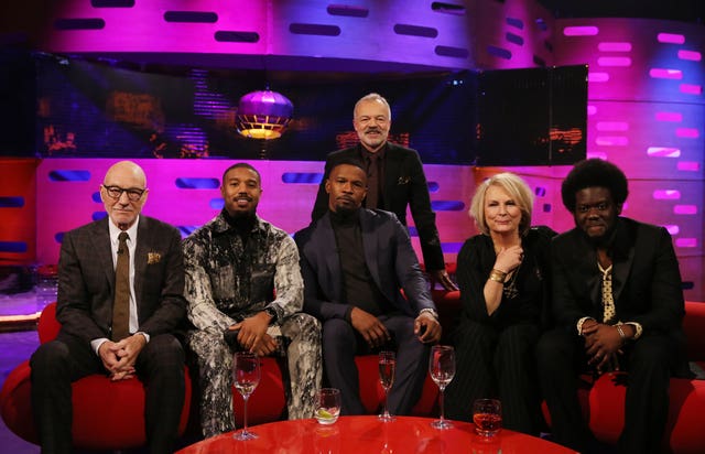 Host Graham Norton with (seated left to right) Sir Patrick Stewart, Michael B Jordan, Jamie Foxx, Jennifer Saunders and Michael Kiwanuka during the filming for The Graham Norton Show 