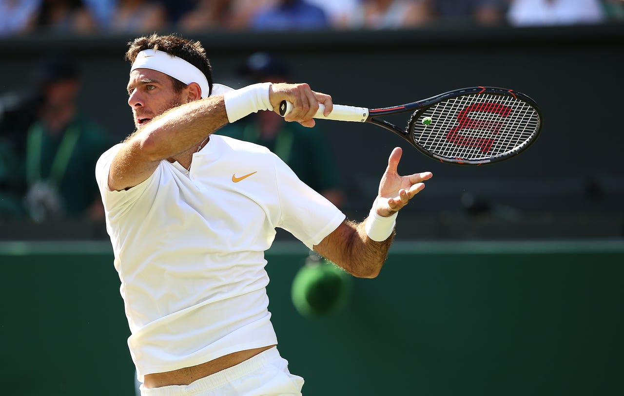 Rafael Nadal fends off mighty Del Potro effort to reach Wimbledon last four...