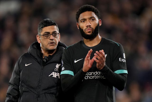 Joe Gomez leaves the field after sustaining a hamstring injury