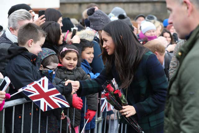 Meghan Markle meets young well-wishers who braved the cold to see her in Edinburgh (Andrew Milligan/PA)